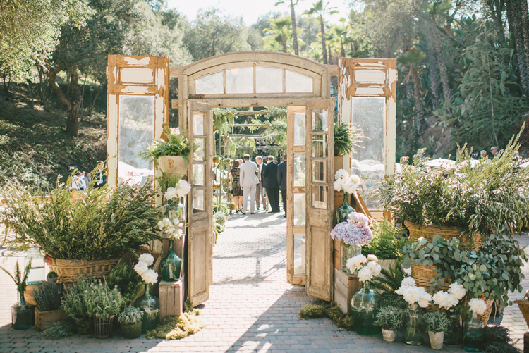 SoCal Rancho Las Lomas Wedding with Sargeant Photography, Inviting Occasion, and unique rustic doors from Found Vintage Rentals
